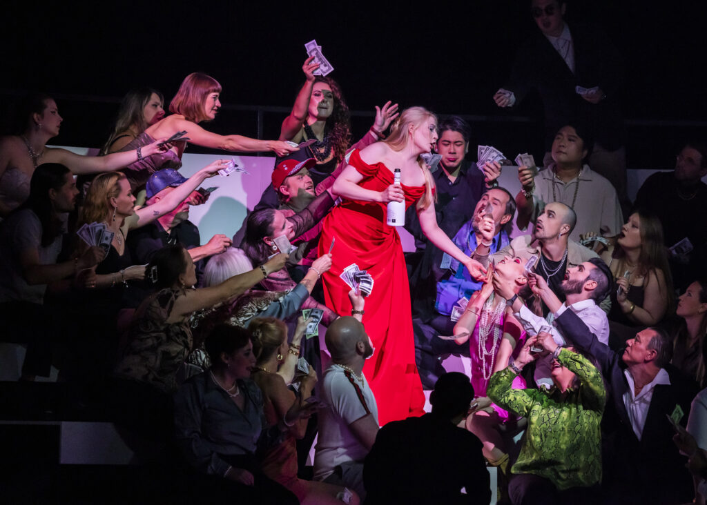 Das Bild zeigt eine Szene aus La Traviata.